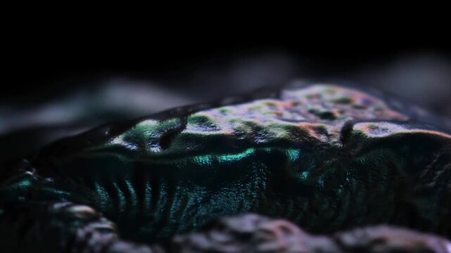 Mysterious Dark Iridescent Ferrofluid Morphing And Shifting In Slow Motion Cinematic Macro Liquid Metal Abstract Ambient Background Overlay With Multi Colored Specular Highlights And Bokeh