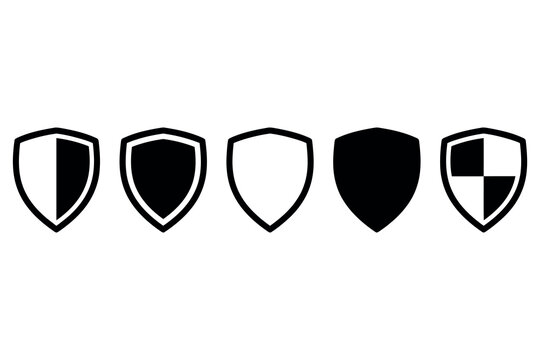 A collection of five distinct shield icons featuring various black and white patterns on a plain background