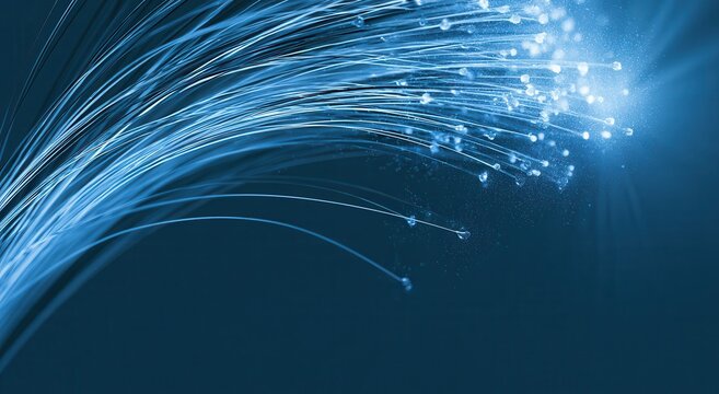 Fiber optic cables glow in a dark environment showing light transmission and data transfer