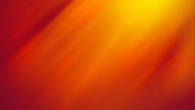 Abstract orange and yellow gradient background with soft light rays and motion blur.