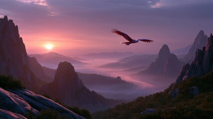 Naklejka premium Eagle flies over mountains at sunrise with mist covering the valleys and rocky peaks in the distance