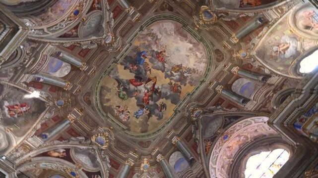 Pietra ligure, liguria, italy. June 24, 2025. Majestic ceiling of the basilica of san nicolo in pietra ligure, italy, featuring ornate baroque frescoes and gilded decorations