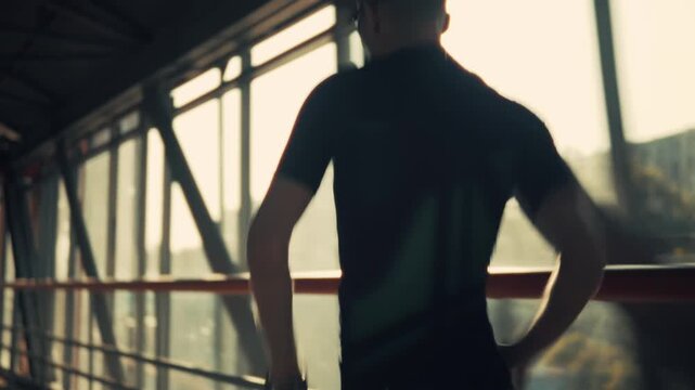 Runner Jogging Inside Modern Bridge. Crossing Urban Architecture. Active Workout. Dynamic Motion