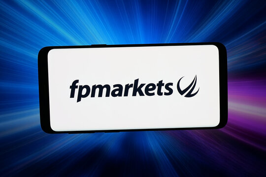 Stuttgart, Germany - 07-17-2026: In this photo illustration, the logo of trading platform company FP Markets is displayed on a smartphone in front of abstract background on computer screen.