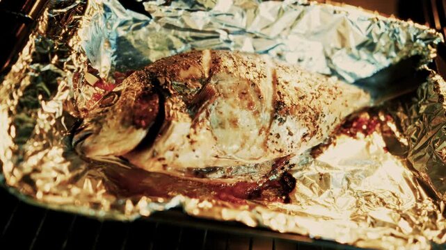 Whole Baked Fish In Foil. Cooking In Oven Seasoned Seafood Recipe. Mediterranean Dish