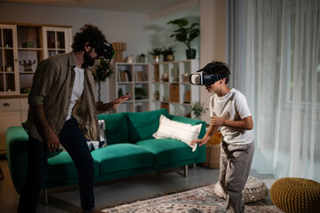 Obraz premium Father and son bonding playing virtual reality game