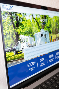 Mexico city, mexico, 04 22 2026, tdc communications website displaying telecommunication service trucks on laptop screen
