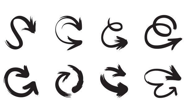 Selection of hand drawn curly and spiral arrows in black ink isolated on white background for design.