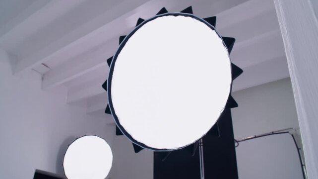 Bright round LED lamp illuminating the photography set
