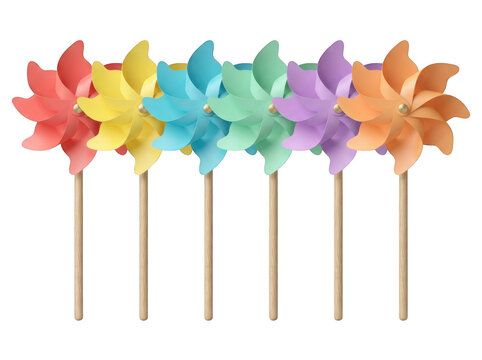 Colorful pinwheels with wooden sticks isolated on a transparent background pink