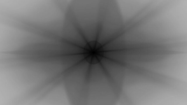 Abstract grayscale motion swirls outward from a central point