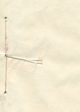 Empty sheet of document with a stamp texture. Vintage stapled paper with holes for fastening. 