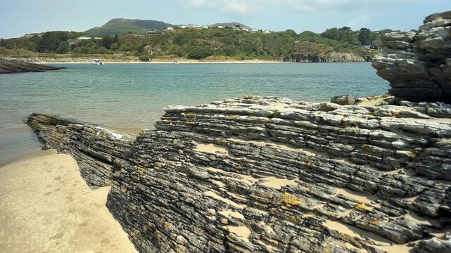 Rock formations at Samson Bay Beach, Morfa Bychan, Porthmadog, Gwynedd, North Wales, UK