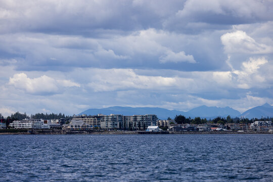 Sidney Waterfront Town and Harbor on Vancouver Island With Cloudy Ocean Skyline and Mountains