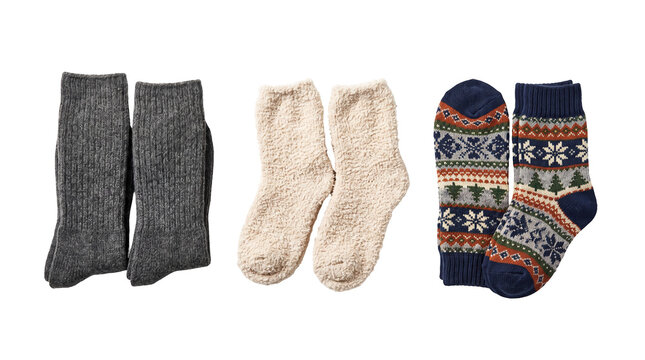 Three pairs of folded socks arranged together, warm winter clothing apparel