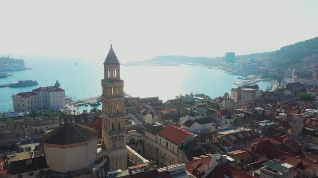 Aerial film of the coast of Split, Croatia, a historic place with old houses and castles on the seafront in Europe