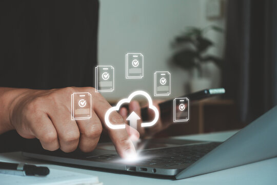 Cloud storage and secure file management on laptop with digital document upload, online backup, data synchronization, cloud computing, cybersecurity, remote access and business workflow concept.