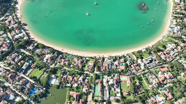 Buzios in Rio de Janeiro. Ferradura beach, Praia da Ferradura. Aerial view, establishing shot.
