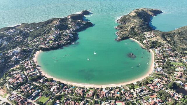 Buzios in Rio de Janeiro. Ferradura beach, Praia da Ferradura. Aerial view, establishing shot.