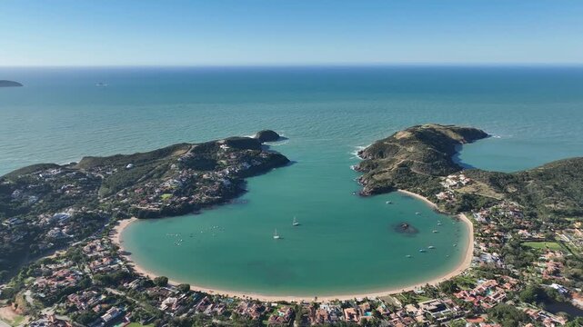 Buzios in Rio de Janeiro. Ferradura beach, Praia da Ferradura. Aerial view, establishing shot.