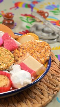 Traditional Mexican candies and sweets on a colorful plate