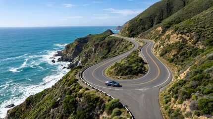 Obraz premium Silver car driving on scenic coastal highway curving along ocean cliffs