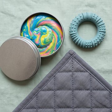 AI generated soft sensory fidget tools set with rainbow putty and blue textured ring