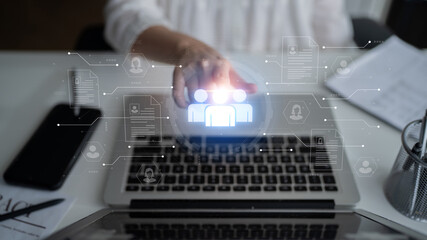Obraz premium Concept of a digital human resources platform for workforce management. An applicant tracking system helps in team building by organizing employee and candidate profiles. Fermion