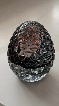 Rotating Transparent Dragon Egg Orgone Generator Handmade with Epoxy Resin, Quartz and Obsidian Crystals, Vertical Social Media Video Format, Fantasy Crystal Art and Mystical Decor Concept
