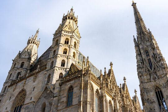 Gothic Cathedral Towers and Ornate Stone Architecture from Below