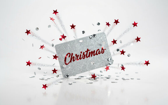 Sparkling Silver Christmas Gift Card Mockup with Red Text and Exploding Festive Confetti on White Background.