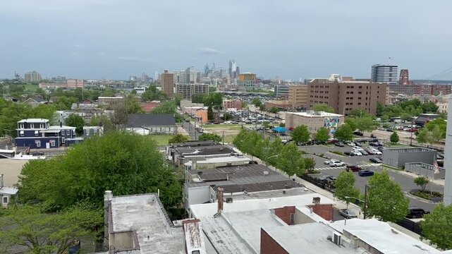 Tilt up establishing shot of a large city cityscape