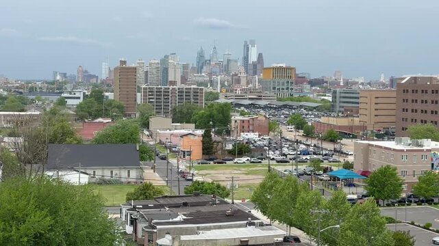Tilt up establishing shot of a large city cityscape