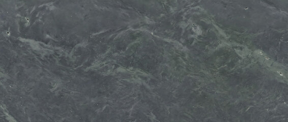Marble texture featuring deep green gray tones with subtle natural veining creates a striking elegant background for luxury interior design projects © UmmeFarhatunnesa