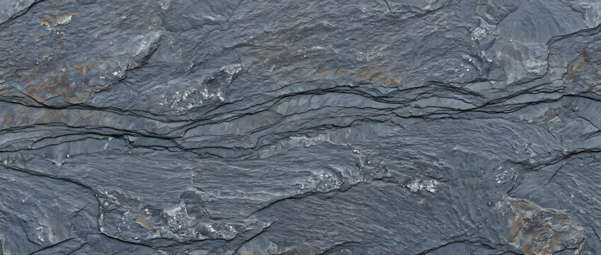 Basalt stone texture featuring deep charcoal blue tones with a smooth uniform surface creates an industrial background for design projects