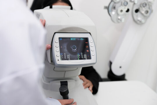 Close-up, refractometer device screen, patient eye exam, vision and eyesight improvement by expert optometrist, diagnostic for eyeglasses lens, professional technology services in optical clinic.