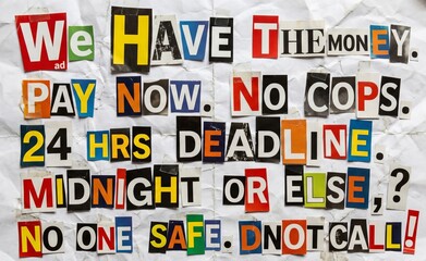 Obraz premium Ransom note message made of cut out magazine paper letters on white background. Threatening letter with criminal demand for money. Concept of crime, kidnapping, extortion and mystery