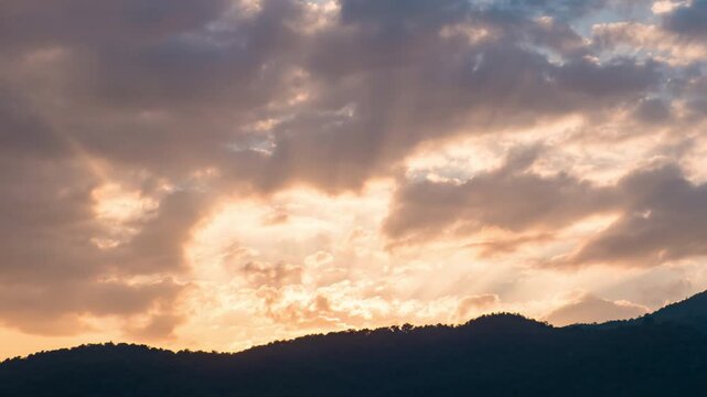 Evening sky time-lapse capturing the shift from sunset glow to night time darkness with subtle cloud movement.