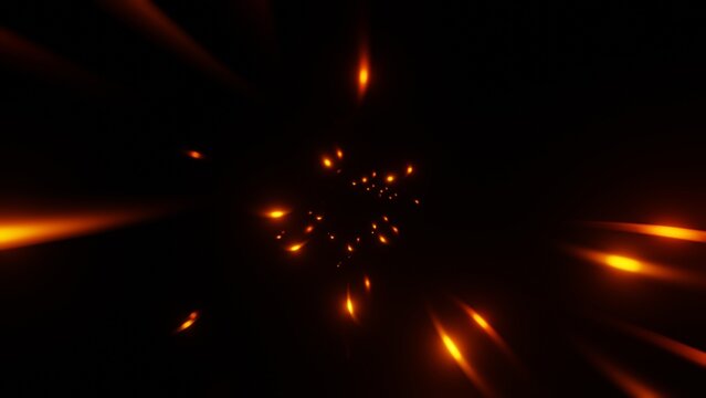 Abstract black background with glowing orange particle streaks exploding from the center in space