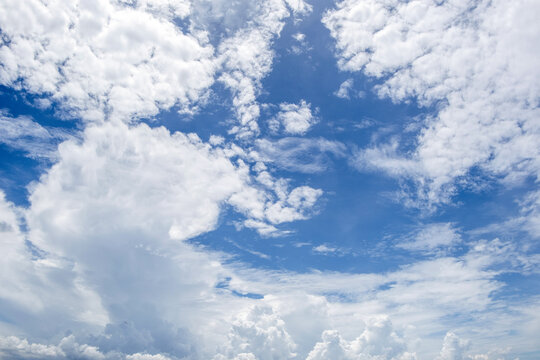 clear blue sky background,clouds with background, Blue sky background with tiny clouds. White fluffy clouds in the blue sky. 