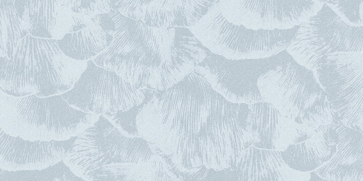 light blue textured background with overlapping fan-like ginkgo leaf patterns.
