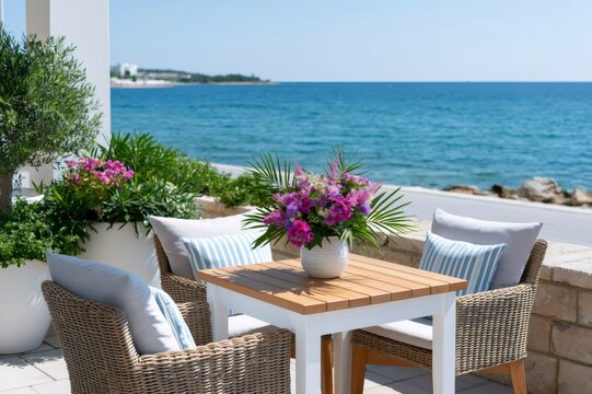 Terrace dining area overlooking blue ocean view