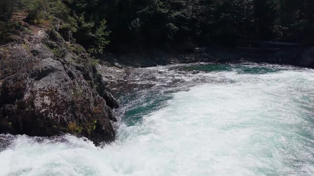 Aerial view of whitewater rapids in Cheakamus River canyon near Train Wreck Trail, Whistler, British Columbia, Canada