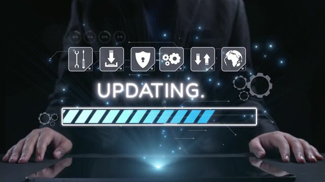 Close-up view of hands on a table with a glowing progress bar representing software updating process, surrounded by digital icons in a dark tech-themed background. Qubit