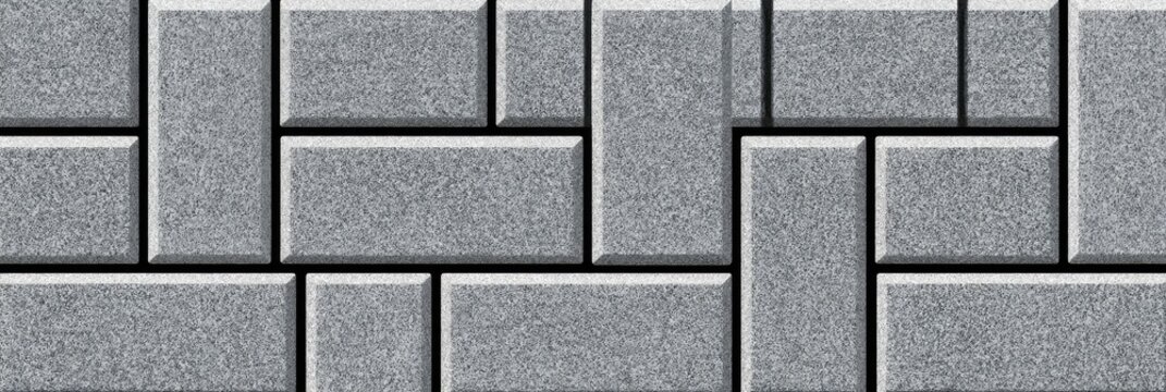 Grey interlocking concrete pavers form a textured geometric pattern