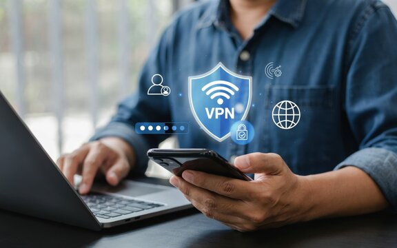 Person using a smartphone and laptop with vpn security icons