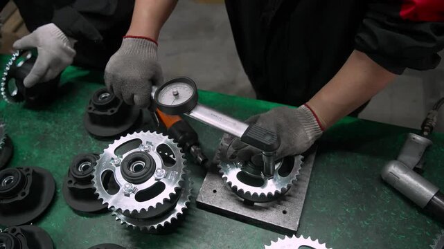 Precise Clearance Measurement Performs with Feeler Gauge on Engine Block Component. Industrial Chinese Factory Quality Inspection Focuses on Vehicle Assembly Line. Technical Engineering Standard 4k