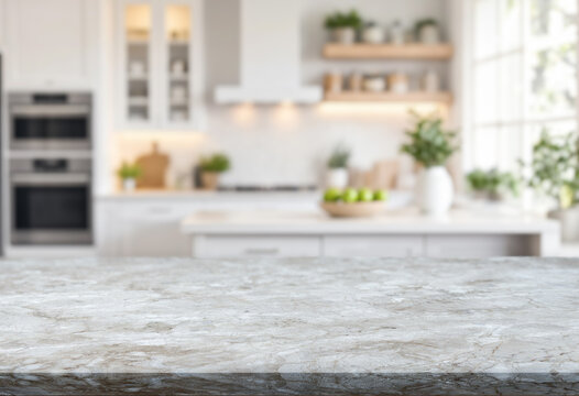 blurred interior of a white kitchen on background and empty marble table on foreground
