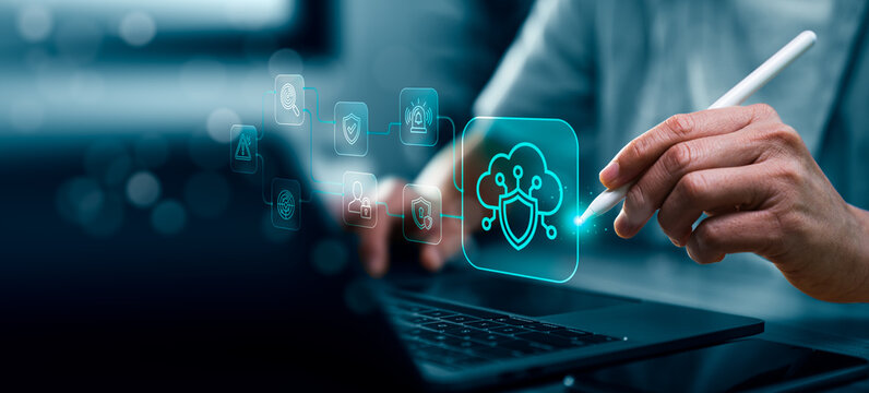 Cybersecurity protection framework concept with business professional using laptop and stylus showing cloud security workflow threat detection authentication monitoring and data protection