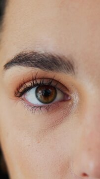 Face, woman and eye test with closeup for vision examination, eyesight assessment and ophthalmology. Person, anatomy and optometry evaluation for retina scan, optical health checkup and wellness.